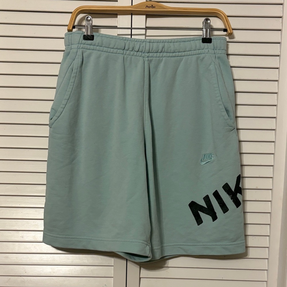 Nike Light Mint Green Athletic Fleece Shorts with Bold Black Logo